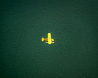 Aerial photo of pontoon boat in flight