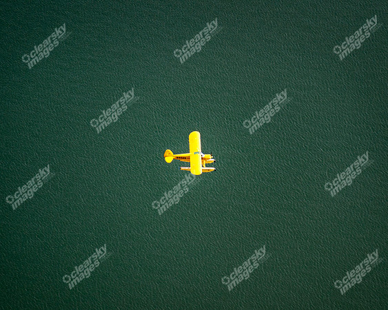 Aerial photo of pontoon boat in flight