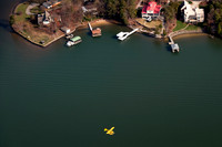 Aerial photo of pontoon boat in flight