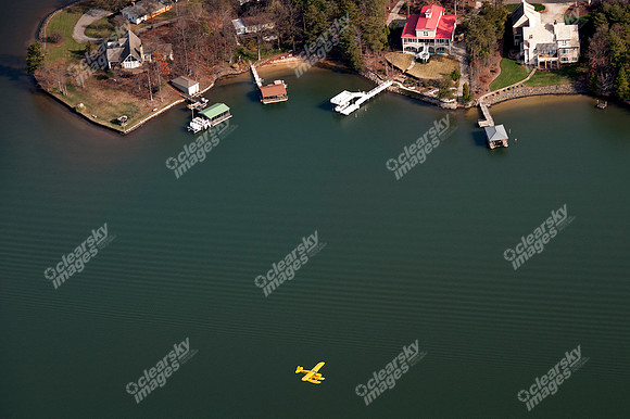 Aerial photo of pontoon boat in flight