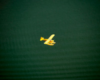 Aerial photo of pontoon boat in flight