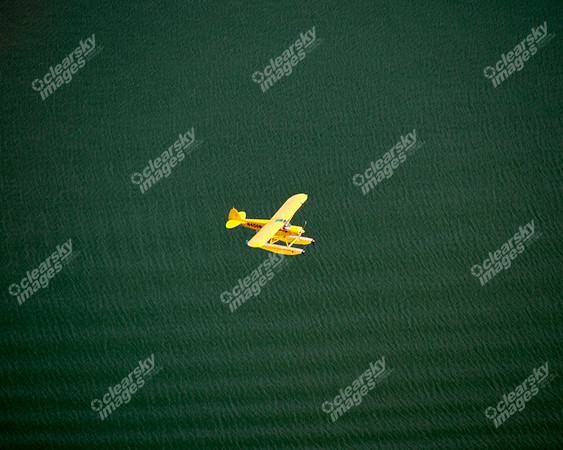 Aerial photo of pontoon boat in flight